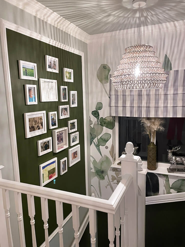 watercolour green floral wallpaper in hallway