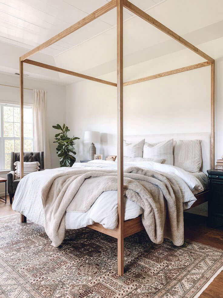 minimalist four-poster bed