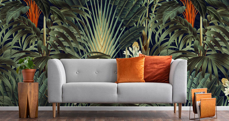 living room with jungle wallpaper with green and orange touches