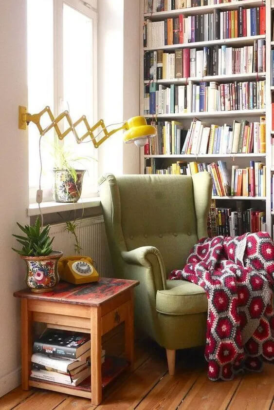 green reading chair and side table