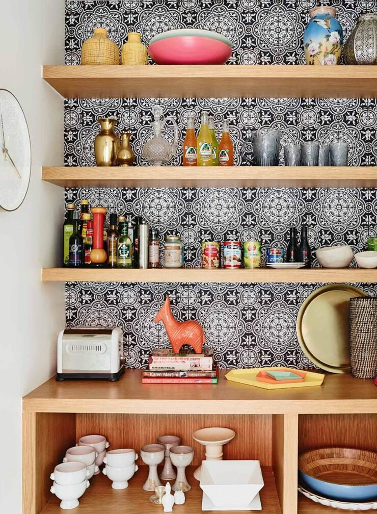 black and white tiles behind shelving