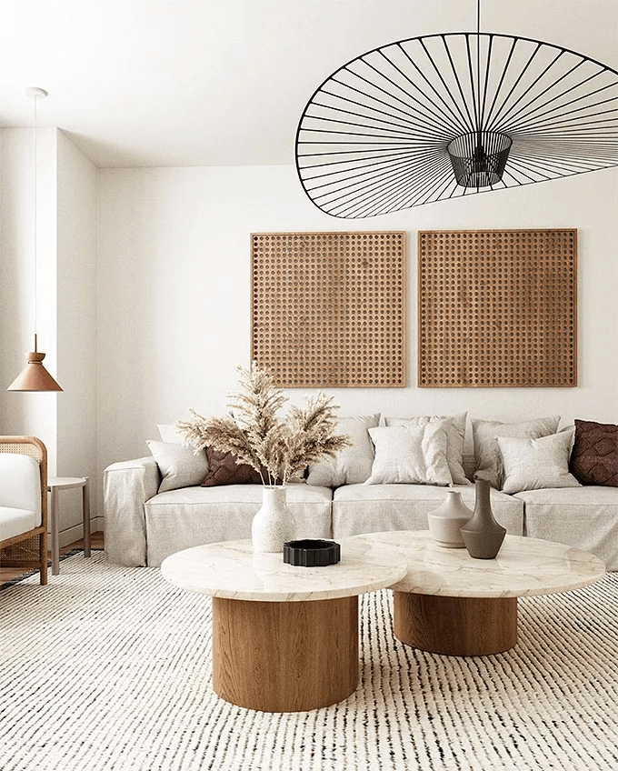 Neutral Japandi styled living room with rattan furniture and cream walls