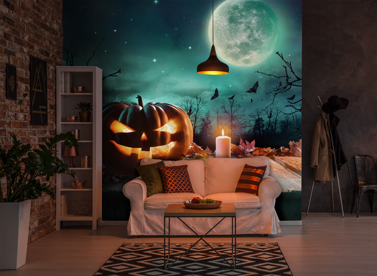 dark living room with a large pumpkin wall mural