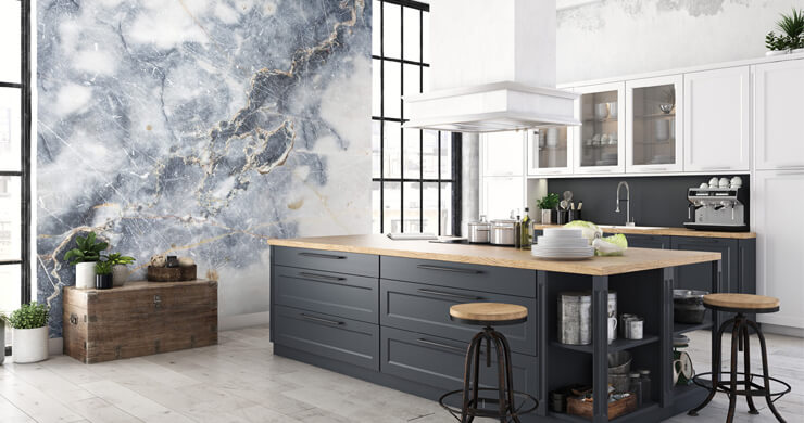 Marble kitchen trends for 2023 in a large blue and white kitchen