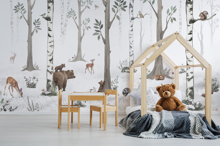 Kids room trends 203 with a minimalist woodland wallpaper in the snow with a wooden bed and white bedsheets