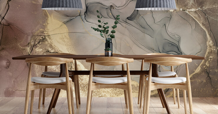 Dining room inspiration with a wooden table and grey chairs with a brown and gold marble effect wallpaper