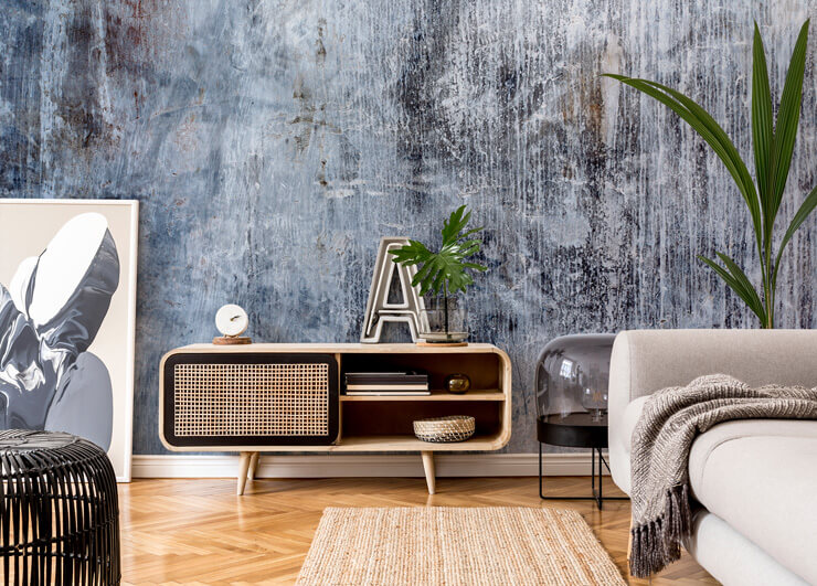 Blue plaster wallpaper in maximalist living room