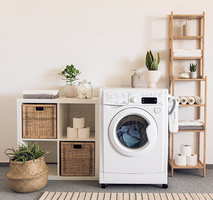 shelves with baskets and containers in laundry room