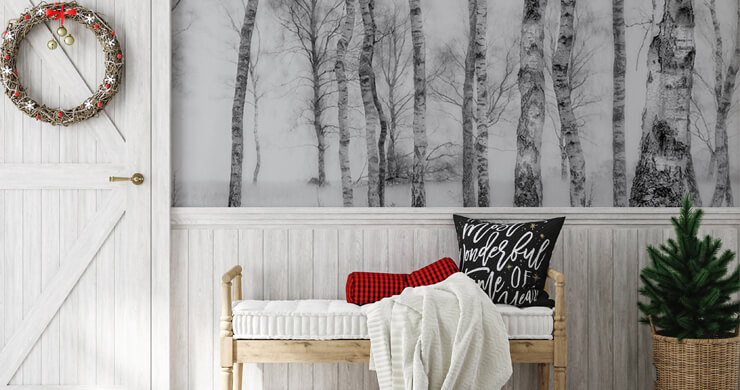festive guest room with tree wallpaper