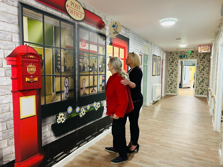 post office mural with dementia patient in nursing home