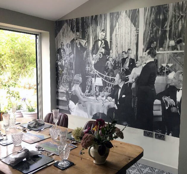 60s black and white fashion wallpaper in dining room