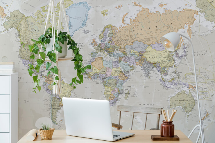 classic world map wallpaper mural in a home office