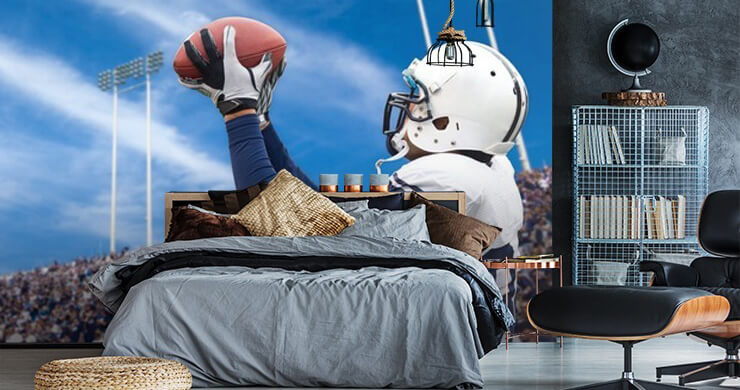 american football player catching a pass wall mural in a bedroom american football player catching a pass wall mural in a bedroom