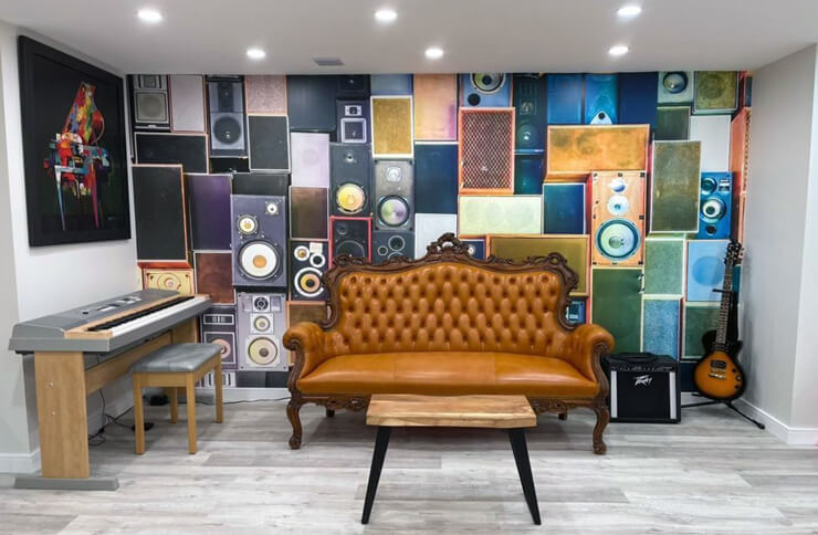 music speakers mural in a basement creative space