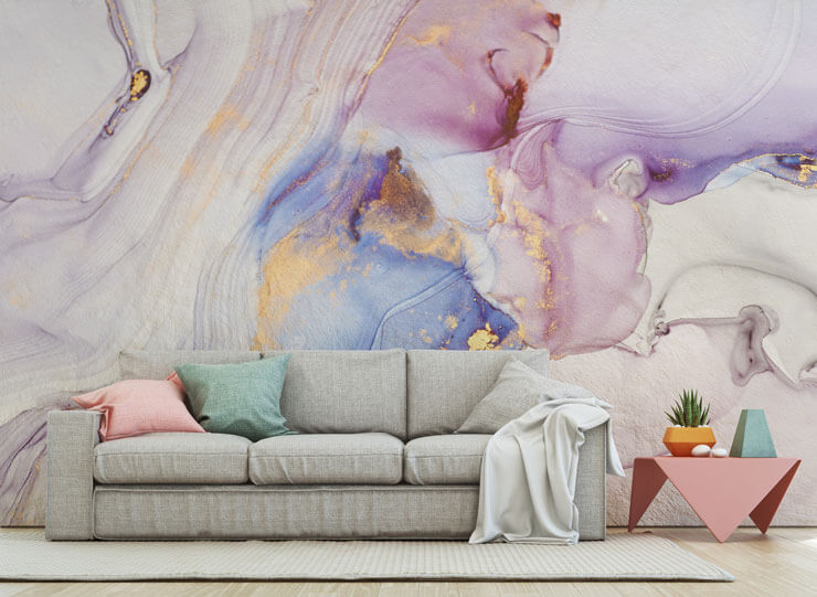 dreamy pastel and gold watercolour mural in a living room