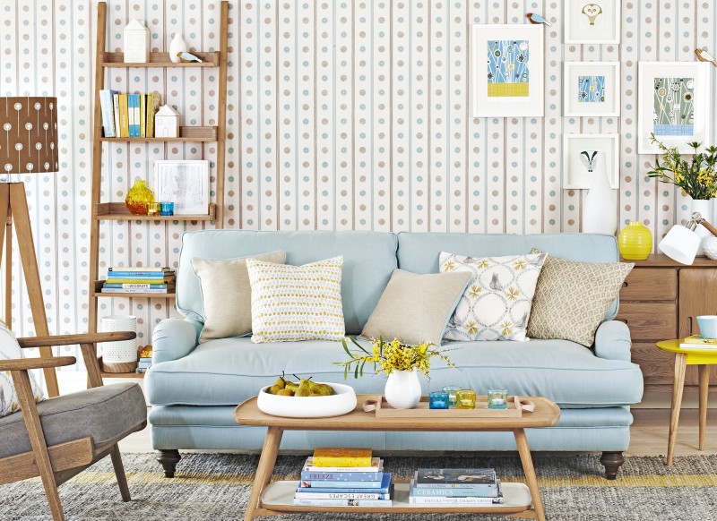 light blue living room with wooden accessories