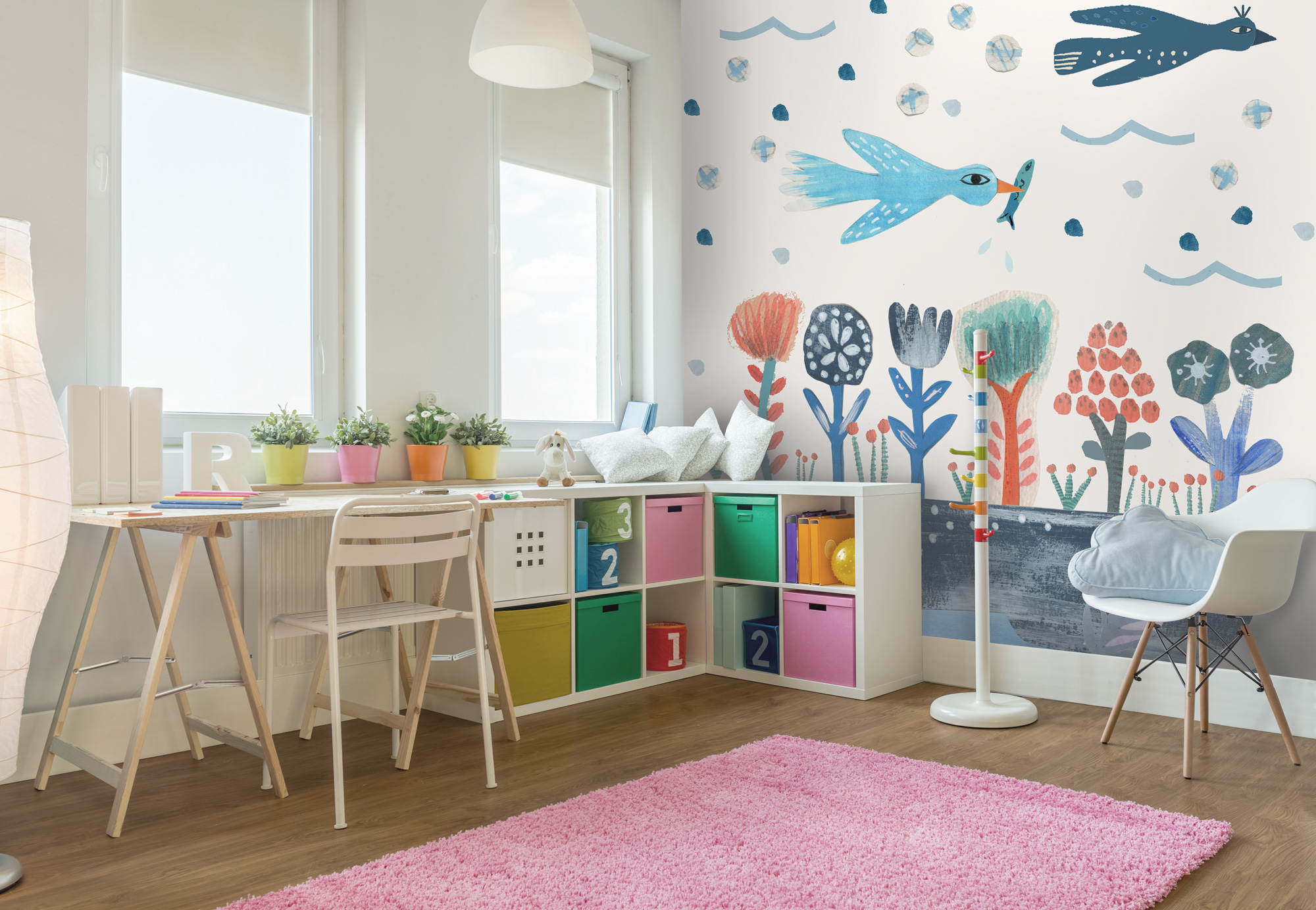 bird wallpaper in blue and red tones in kids bedroom with colourful shelves