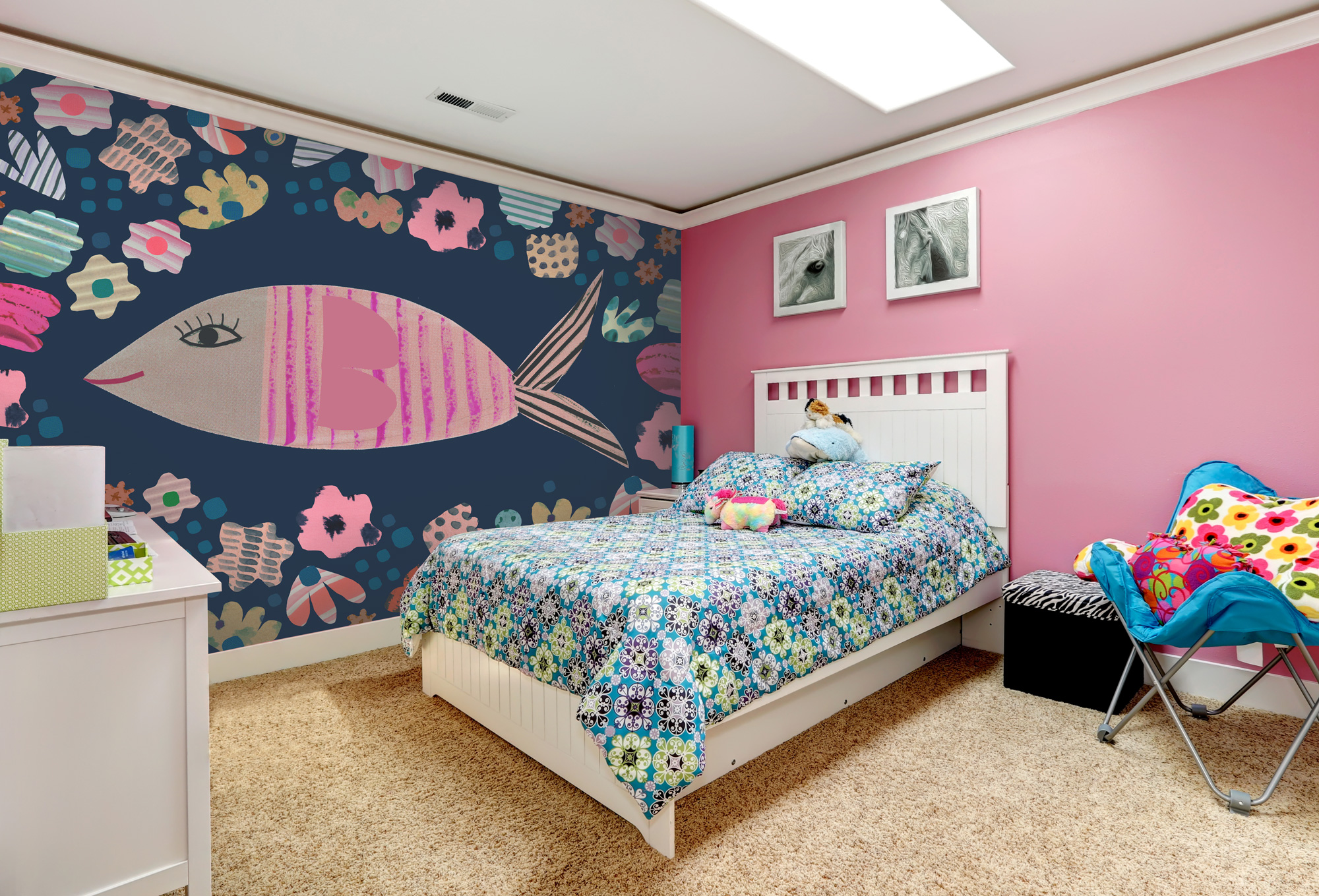 fish painting wallpaper in child's cosy bedroom