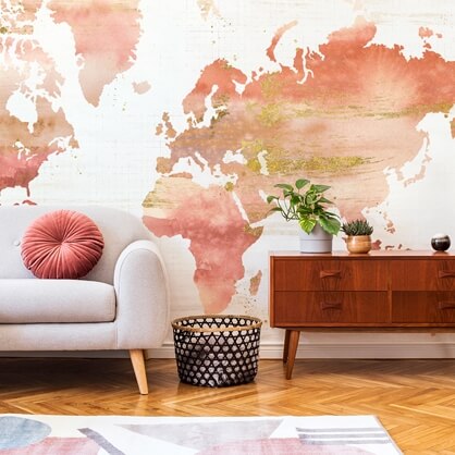 orange watercolour world map wallpaper in living room