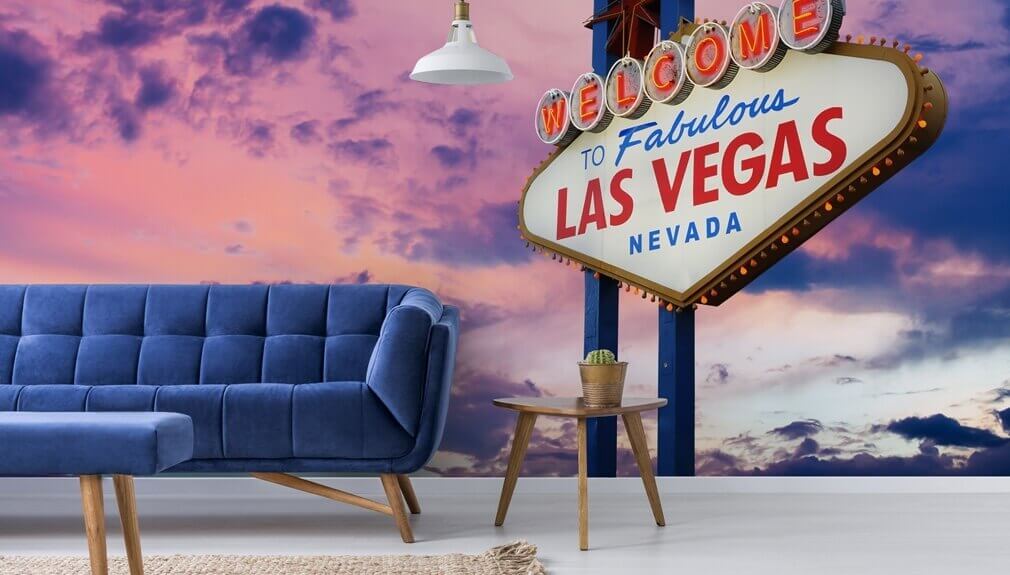 Vegas wallpaper in living room with blue sofa
