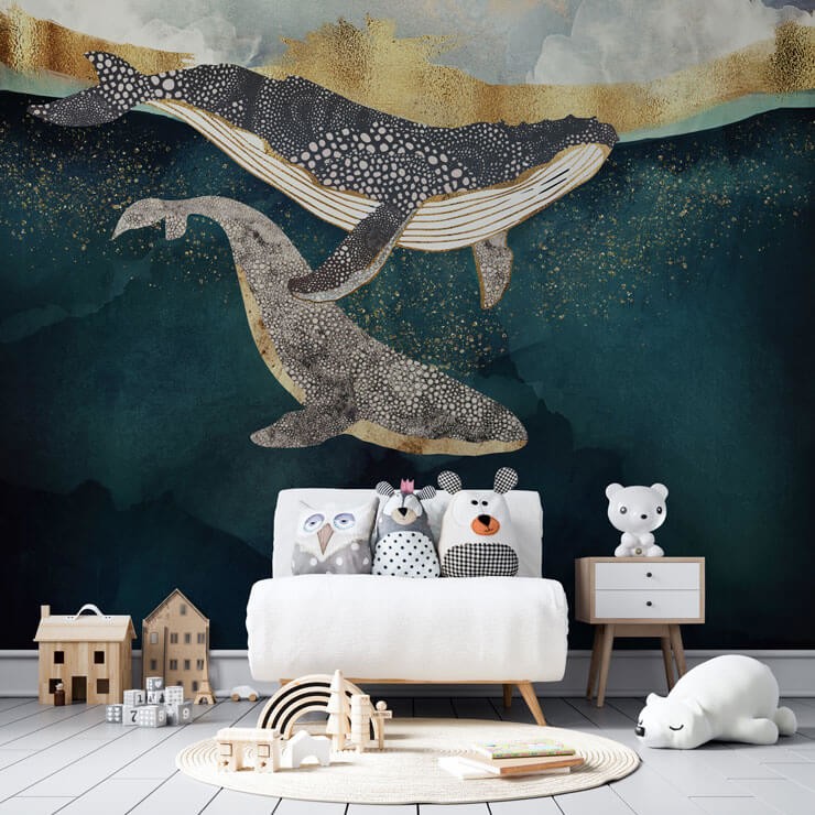 abstract navy and gold toned whale wallpaper in kids room with dolls houses and small couch