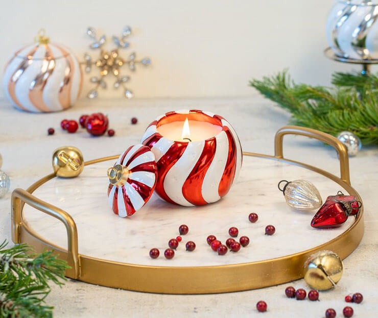 white and red bauble candle