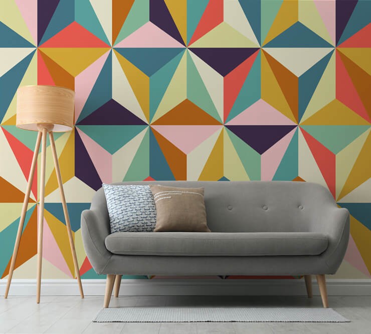 colorful geometric pattern wallpaper in 70s style living room