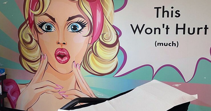 Beauty salon design ideas with a pink and blue pop art wall mural on the wall of a beauty salon