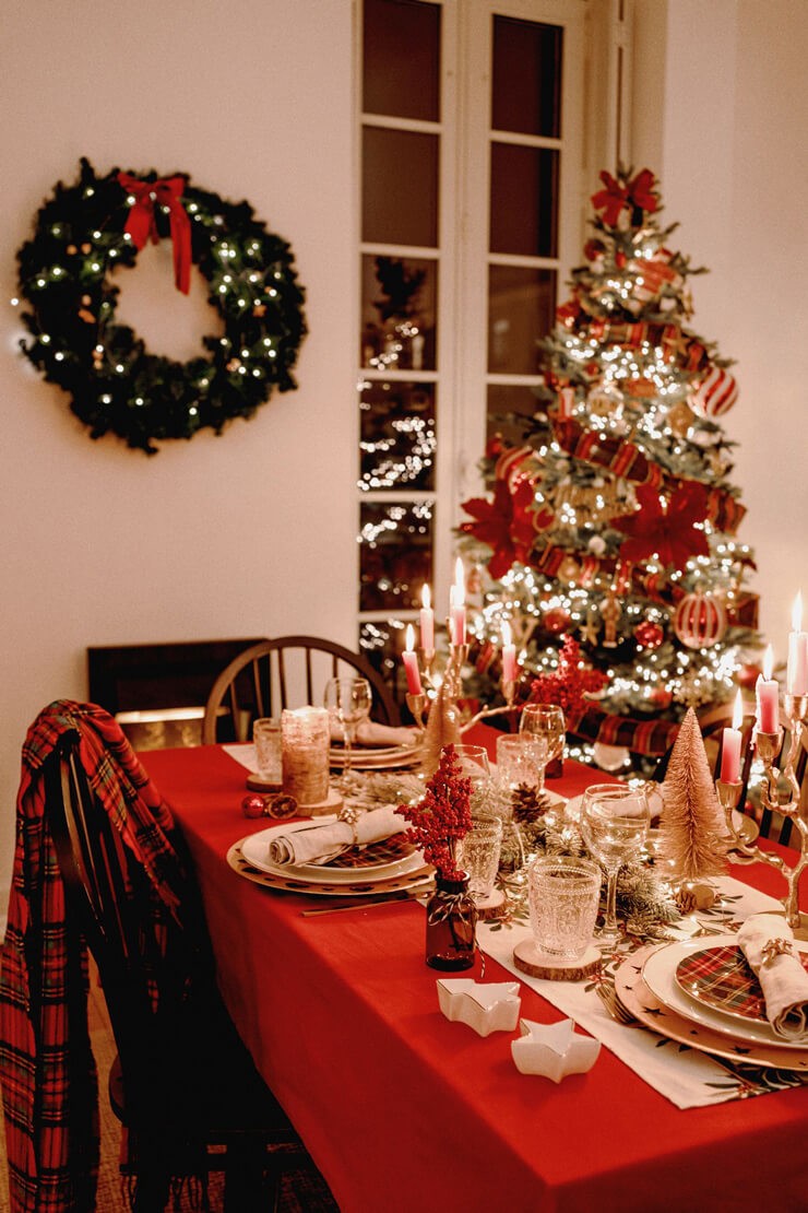 Red Christmas table decor in a red themed dining room