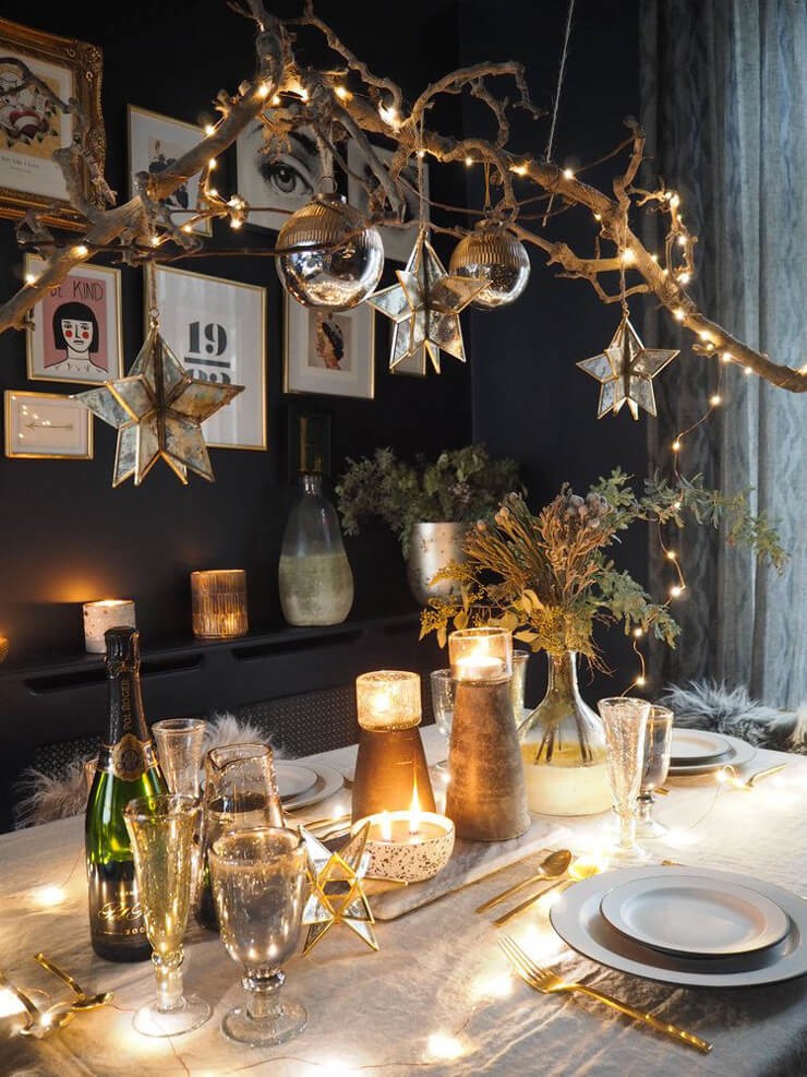 Dark blue dining room with a christmas table with minimal accessories