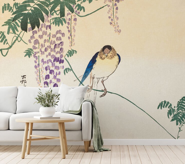 Neutral living room with a white sofa and a pine coffee table with an oriental bird wall mural
