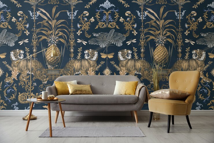 Gold and blue living room with a gold and blue wallpaper with gold and grey furniture