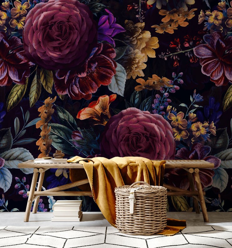 Dark floral wallpaper with pink and purple flowers and a wooden benchandmuted gold throw