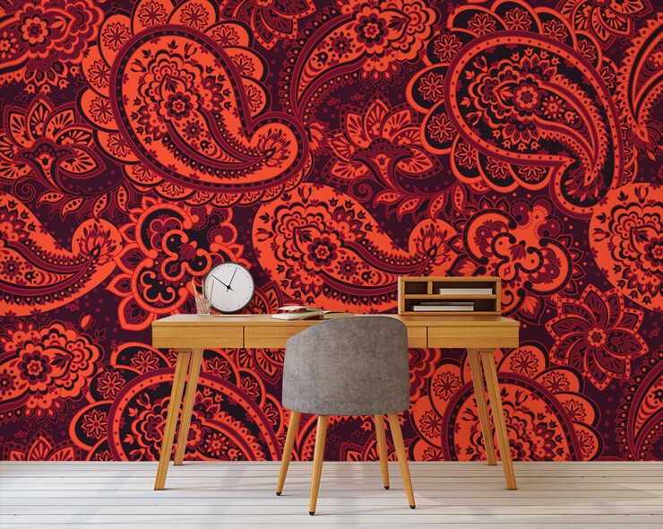 bright red paisley wallpaper in home office with wooden chair