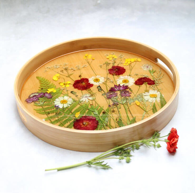 flowers under resin on tray