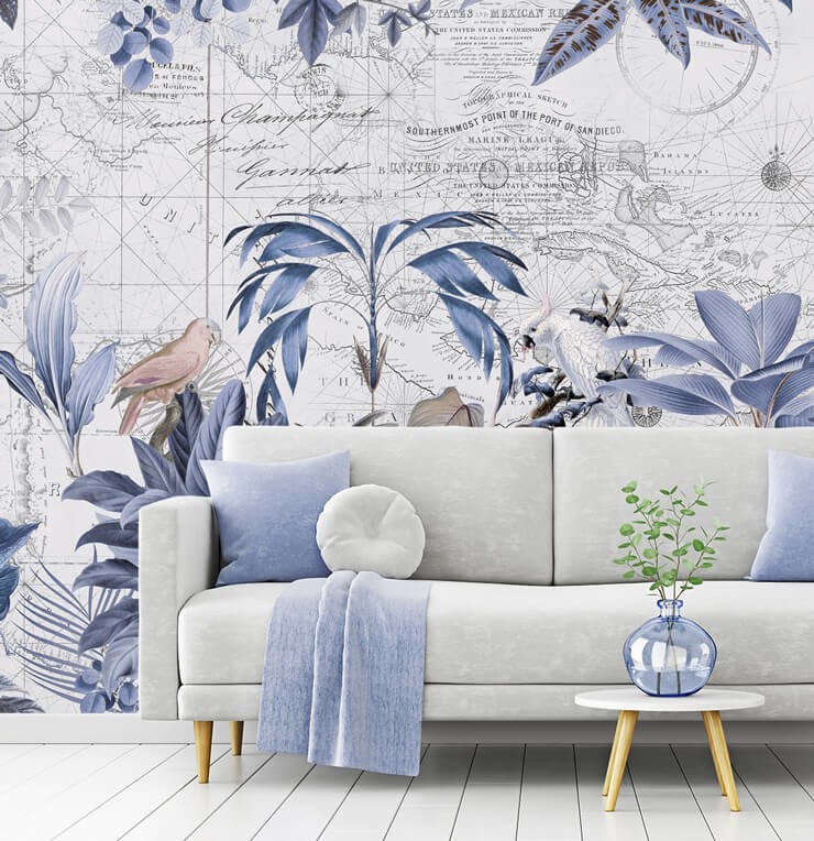 navy jungle map wallpaper with light grey and blue cushions