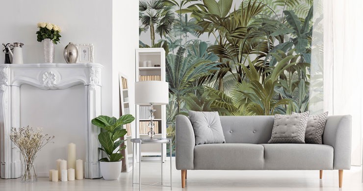 illustrated leafy jungle wall mural in stylish open plan lounge