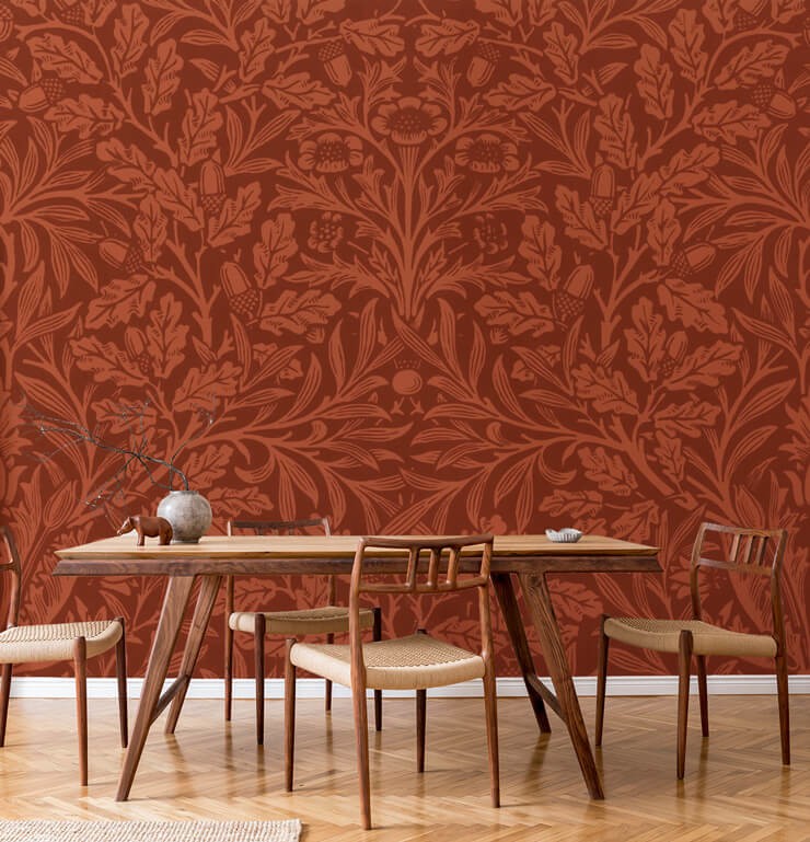 dark orange leaf wallpaper in dining room with dark dining set