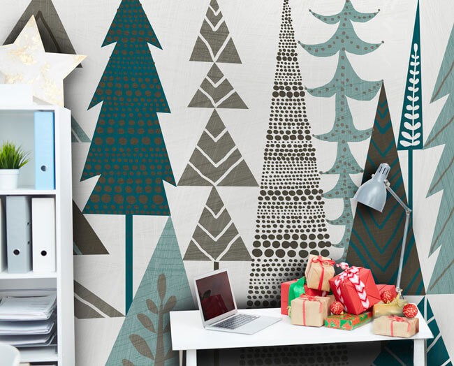Home office with a white desk and green scandi style Christmas wallpaper