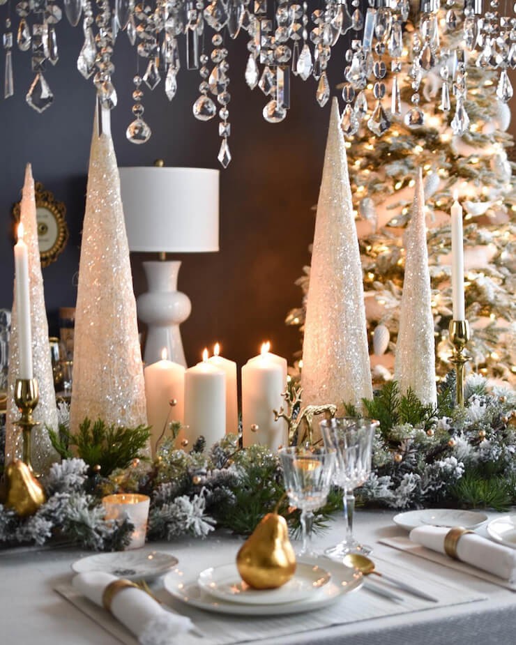 silver christmas table with sparkly trees and accessories
