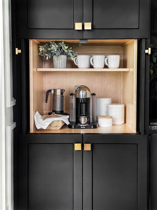 black cabinet with coffee station in middle