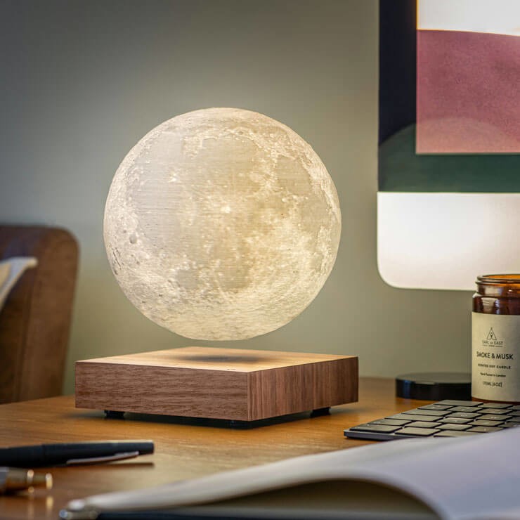 flouting moon lamp on table