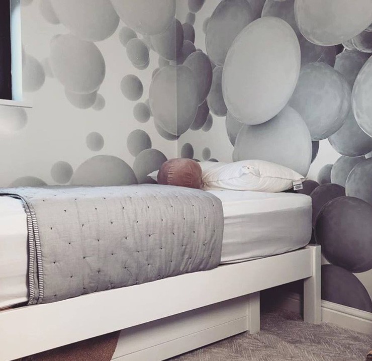 nordic style bedroom with grey circular wallpaper