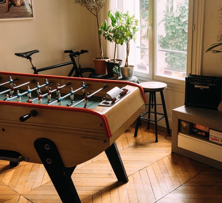 football table by window in games room ideas