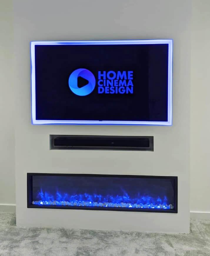 media wall with faux fireplace and soundbar