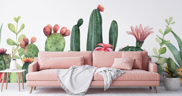 pink and green watercolour painted cacti mural in pink lounge