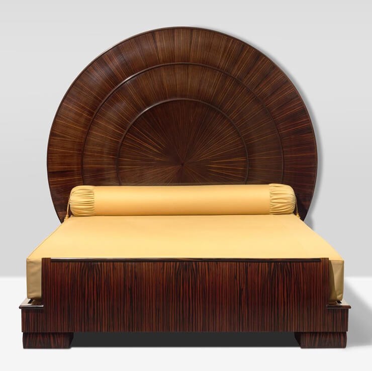 round headed wooden art deco bedframe with yellow bedding