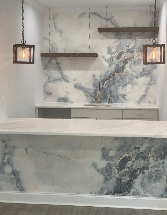 blue and white marble mural in kitchen