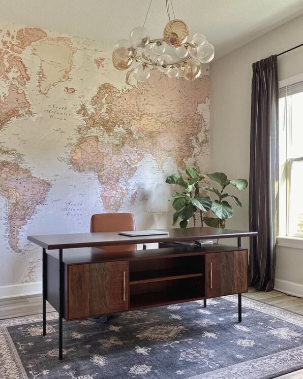 beige toned world map wallpaper in mid century style office