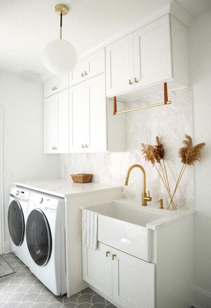 off-white laundry room with old, deep sink